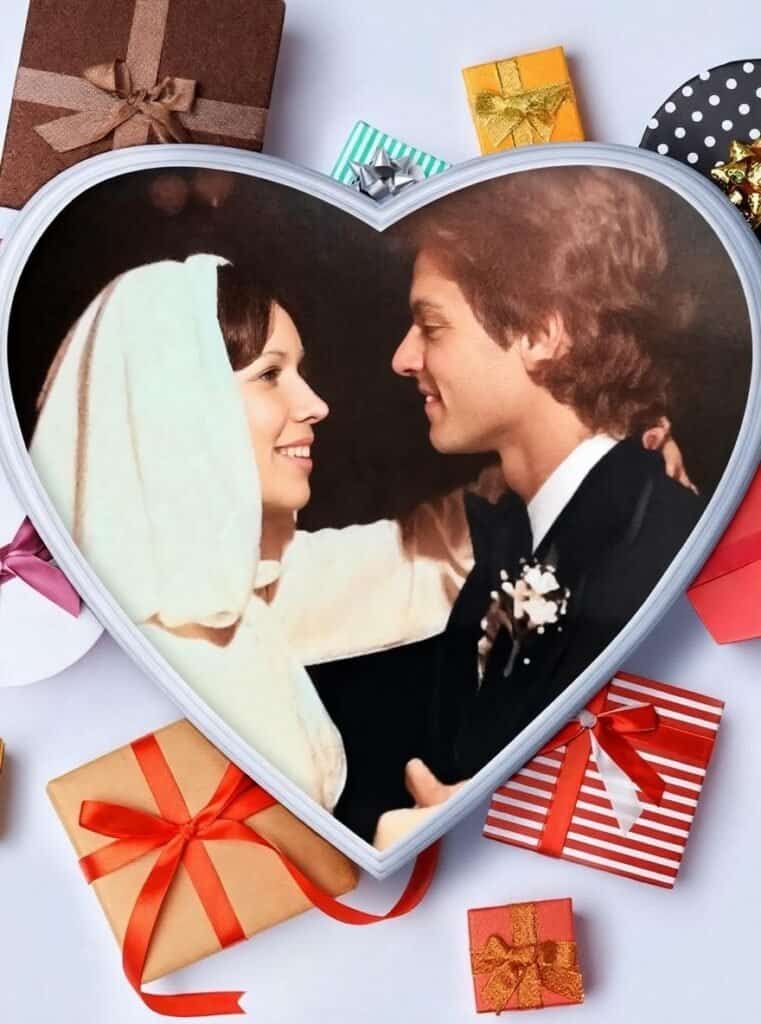 Wedding couple in a heart-shaped photo frame.